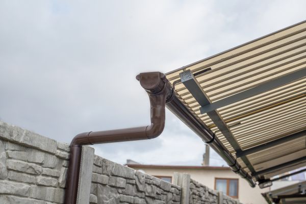 Plastic Downspout Installation in Cornelius